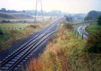 Moffat Mills Junction looking east. The Moffat Mills branch has been cut back to the former junction from Inverhouse distillery.<br><br>[Ewan Crawford //1987]