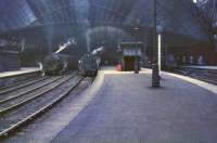 Around 5.30pm at St Enoch on 23 July 1964. Locomotives are 45171, 80005, 80058 and 45124.<br><br>[John Robin 23/07/1964]