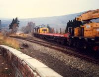 The permanent way train takes the Fort William route at Crianlarich Junction.<br><br>[Ewan Crawford //1987]