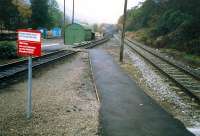 View looking to Glasgow showing the goods yard at Arrochar and Tarbet. It was in use for timber traffic. The platform has subsequently been extended to by the pole.<br><br>[Ewan Crawford //1987]