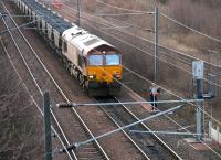 Hold up. Coal empties held at the north end of Millerhill Yard - April 2006. Locomotive is EWS 66193.<br><br>[John Furnevel 05/04/2006]