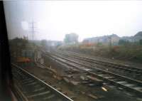 Portobello Junction during a transition - note pegs for track realignment. The line to the right is for the Sub and Millerhill yard. From eastbound local.<br><br>[Ewan Crawford //1987]