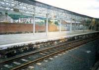 <i>Im on the train</i>. Glass canopies and internal reflections at Largs.<br><br>[Ewan Crawford //1987]