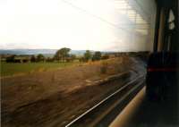 The Kilbarchan line merging with the GPK&AR line at Brownhill junction. Some ballast remained on the closed route. The line was quadruple from here to Dalry Junction.<br><br>[Ewan Crawford //1987]