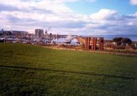 Many locomotives met their end here. By the brick structure was Troon shed where locomotives were scrapped. The eastern breakwater can also be seen. This may be the site of the original Troon station.<br><br>[Ewan Crawford //1987]