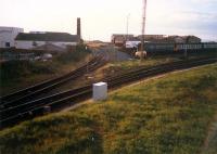 Newton-on-Ayr looking west to the freight lines. The DMUs sit in sidings which are the cut-back of the original Ayr station which was off to the left.<br><br>[Ewan Crawford //1987]