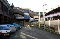 Early Sunday morning in Waverley's southside car park on 16 April 1996. View towards the stairs leading up to join the footbridge and cross-station walkway. This runs from the station's Market Street entrance (top left), across to the Waverley Steps entrance and Princes Street on the north side. A Virgin Voyager for Aberdeen is standing at <I>sub</I> platform 21.<br><br>[John Furnevel 16/04/2006]