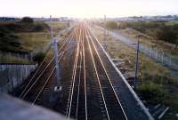 Looking west at what was Stevenston No 1 jnct. The L&AR approached from distant right and merged. Before the LMS alterations it flew over the line and travelled to Kilwinning East on an alignment to the south (the left) of the extant line.<br><br>[Ewan Crawford //1987]