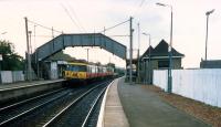 Looking west at Bellshill. Glasgow bound inner Hamilton Circle train.<br><br>[Ewan Crawford //1987]