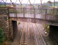 The line with the highest incidence of <i>bricking</i> in Europe. Protective measures on the R&C west of Bargeddie.<br><br>[Ewan Crawford //1987]