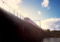 Eastbound 303 crossing the Leven Viaduct.<br><br>[Ewan Crawford //1987]