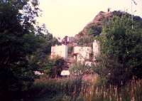 Dumbuck quarry from the former NB line. The plant shown here has been demolished. This was served by the NBs Dumbuck Siding which has a long loading bank.<br><br>[Ewan Crawford //1987]