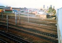 Larkfield Junction looking north. A pair of electric locomotives are about to leave with a freightliner train from Gushetfaulds - once site of a coal depot and South Side station.<br><br>[Ewan Crawford //1987]