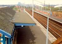 Wishaw (Central) viewed from the south. Ravenscraig can be seen in the distance. The building has been demolished.<br><br>[Ewan Crawford //1988]