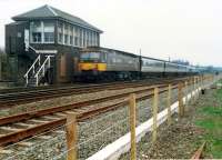 A 477 propels a Glasgow train past the box at Greenhill Upper Junction.<br><br>[Ewan Crawford //1987]