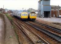 DMUs pass just north of Larbert station.<br><br>[Ewan Crawford //1988]