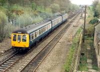 Southbound DMU at Plean Junction viewed from the box. Old station building on right. Access by kind permission of British Rail.<br><br>[Ewan Crawford //1988]