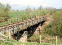 Looking east to Polmaise. The location from which the camera was taken is now the A91. The line is closed and lifted.<br><br>[Ewan Crawford //1988]