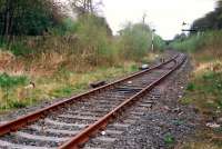 Looking east from Alloa West Level Crossing in 1988. Clearly the line had been double track (actually two single tracks in later days) until relatively recently. The box had just closed and been demolished.<br><br>[Ewan Crawford //1988]