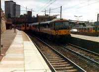 Three trains at Motherwell. Local (left probably for Lanark), long distance (centre) and local (right probably for Hamilton).<br><br>[Ewan Crawford //1988]