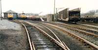 Looking west at Stranraer Town. The goods shed was used by a maintenance trolley, in front of it locomotives were stabled, in the goods yard car-trains parked and the line to the harbour was extreme right.  Access by kind permission of British Rail.<br><br>[Ewan Crawford 19/03/1988]