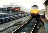 Glasgow train waits by Stranraer Harbour signalbox. Access by kind permission of British Rail.<br><br>[Ewan Crawford //1988]