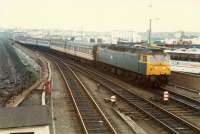 View from the signalbox; the train from London arrives to connect with the Galloway Princess. Access by kind permission of British Rail.<br><br>[Ewan Crawford //1988]