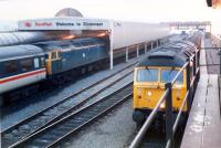 View from Stranraer Harbour signalbox in 1988. The train from London arrives to connect with the 'Galloway Princess'. To the right the Glasgow train awaits departure. Access by kind permission of British Rail.<br><br>[Ewan Crawford //1988]