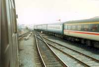 In the increasing gloom an 08 draws up to the London trains stock to withdraw it from the station.<br><br>[Ewan Crawford //1988]