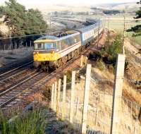 Belting north from Crawford is this train about half way between Crawford and Abington.<br><br>[Ewan Crawford //1988]