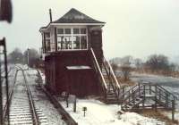 Passing Lugton box heading south. Before the line was singled and station closed it was just beyond the box. The left track is for Kilmarnock and right for RNAD Giffen.<br><br>[Ewan Crawford //1988]