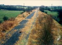 Crosshouse Junction looking to Kilmarnock. After closure the Kilmarnock bound track remained in place for some time. In fact by this date, 1988, the track still reached the junction point in the distance.<br><br>[Ewan Crawford //1988]