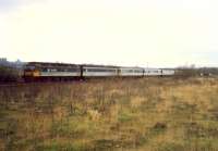 Diverted from the E&G line is this Edinburgh and Glasgow Railway 477 heading west at the site of Clyde Iron. After diversions that day the R&C was officially closed to passengers only to re-open with new stations a few years later.<br><br>[Ewan Crawford //1988]