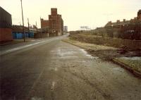 Looking west along Castlebank Street/South Street by the remains of Partick West station (right). Here began the Clydeside Tramway (foregound right to Meadowside Granary and beyond. Area now redeveloped.<br><br>[Ewan Crawford //1988]