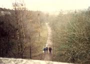 Looking south-west with Whiteinch West Junction behind the camera. The walkers take the route used to connect the Whiteinch line to the newer Glasgow Yoker and Clydebank alignment from Whiteinch East Junction. The old alignment was to the left.<br><br>[Ewan Crawford //1988]