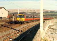 303 005 on the approach to Craigendoran from the east.<br><br>[Ewan Crawford //1988]