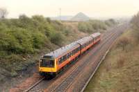 Eastbound DMU at Gartshore. The bing at Waterside can be seen in the background.<br><br>[Ewan Crawford //1990]