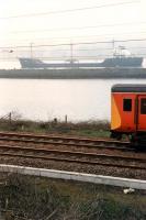 Eastbound ship passing westbound train at Bowling Harbour.<br><br>[Ewan Crawford //1990]