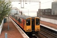 314 212 passes Bowling signalbox with a Drumgelloch service. Access by kind permission of British Rail.<br><br>[Ewan Crawford //1990]