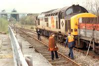 37 403 at Crianlarich Lower. A quick discussion before releasing the locomotive to run back to Glasgow light engine. Line here now closed and lifted.<br><br>[Ewan Crawford //1990]