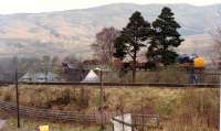 Oor Wullie enters Crianlarich from the north with the Fort William-Mossend freight.<br><br>[Ewan Crawford //1990]