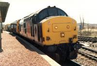 A 37 with an engineers inspection coach at Rannoch. This northbound train was looped to let the passenger Sprinter pass.<br><br>[Ewan Crawford //1990]