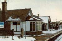 Carrbridge station building viewed from a northbound train. The projecting part of the building was the north box.<br><br>[Ewan Crawford //1989]