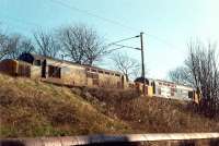 A Hunterston-Ravenscraig coal train heads east to Paisley Gilmour Street.<br><br>[Ewan Crawford //]