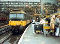 <h4><a href='/locations/G/Glasgow_Central'>Glasgow Central</a></h4><p><small><a href='/companies/G/Glasgow_Central_Station_Caledonian_Railway'>Glasgow Central Station (Caledonian Railway)</a></small></p><p>47 in platform 2 at Central. Funny how fashions change. 4/28</p><p>26/11/1988<br><small><a href='/contributors/Ewan_Crawford'>Ewan Crawford</a></small></p>