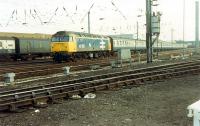 47 597 comes up from the Newcastle line with a Settle and Carlisle Line train. A great day if you liked 47s.<br><br>[Ewan Crawford 26/11/1988]