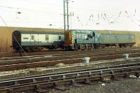An 08 shunting Motorail coaches on a day of class 47s monotony at Carlisle. Exotic.<br><br>[Ewan Crawford 26/11/1988]