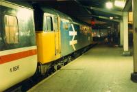 47 617 waits to leave for Glasgow at Carlisle. In the background a bit of post-diversion analysis is going on.<br><br>[Ewan Crawford 26/11/1988]