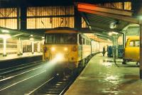 An 86 with searchlight at Carlisle. This dropped off to be replaced by a Railfreight 47. A very cold trip ensued.<br><br>[Ewan Crawford 26/11/1988]