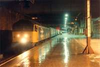 Finally, running about 2 hours late, the Edinburgh portion of a combined Edinburgh and Glasgow train to Inverness arrives at Perth on 3 January 1989.<br><br>[Ewan Crawford 03/01/1989]